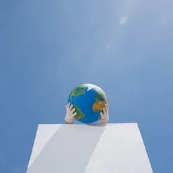 Globe on a pedestal, blue sky